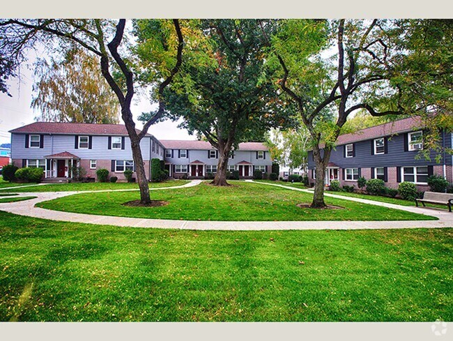Building Photo - Tranquil Mid-Century Retreat in a Lush Set... Unit 012 Rental