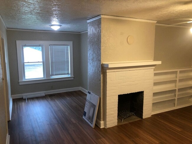 Photo - Freshly Painted 2x1 with Brand-New Plank F...