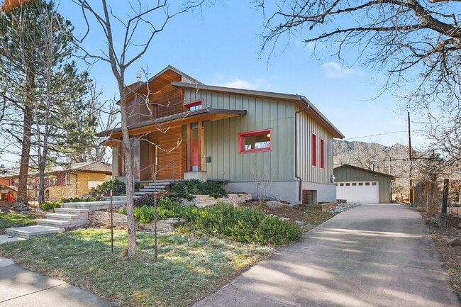 Photo - "Modern 4-Bed Boulder Retreat with Granite Elegance & Finished Basement!"