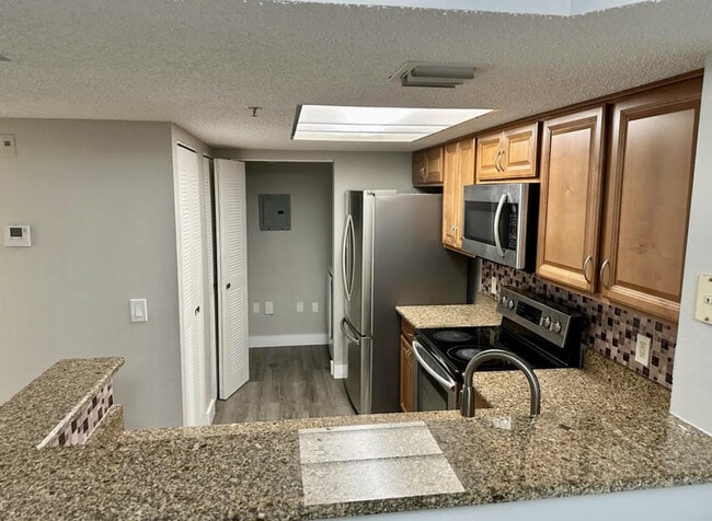 Photo - 5021 Wiles Rd Unidad 205