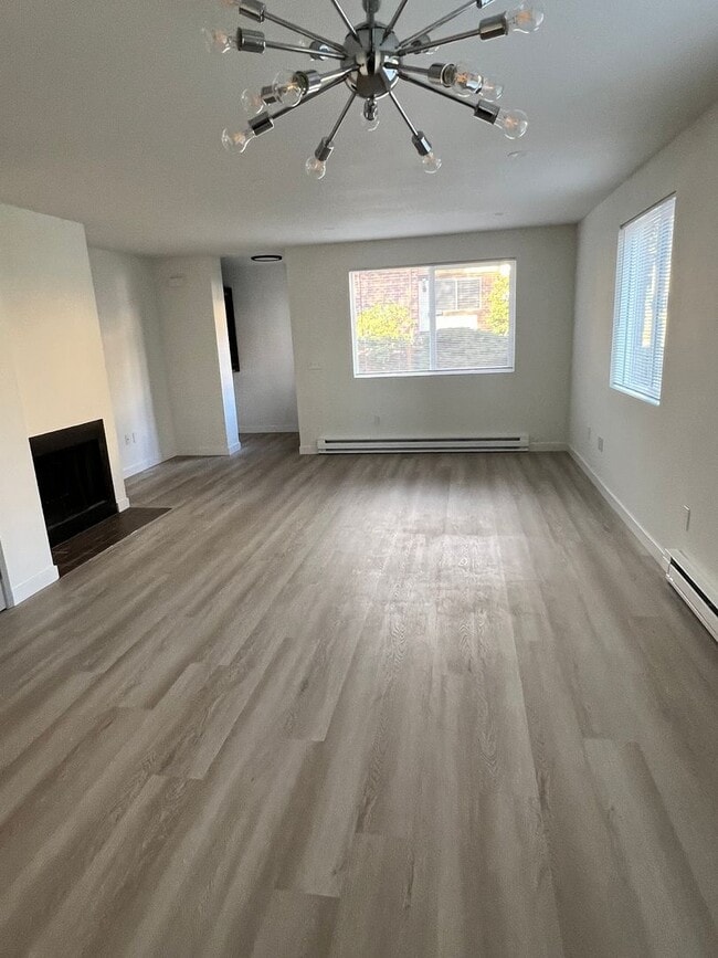 Building Photo - 11334 3rd Ave NE Unit D