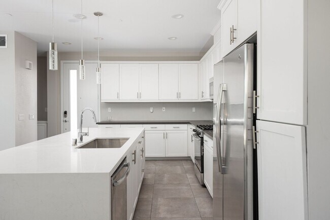 Photo - Spacious 4 Bedroom Townhome in the Millenia Community!