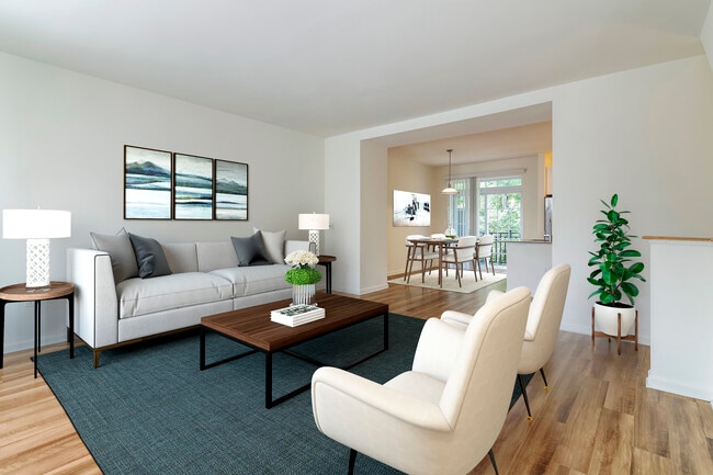 Renovated Package II living and dining area with hard surface flooring