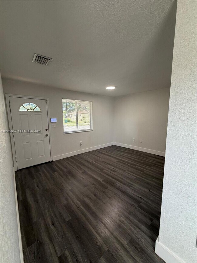Photo - 590 NW 58th St