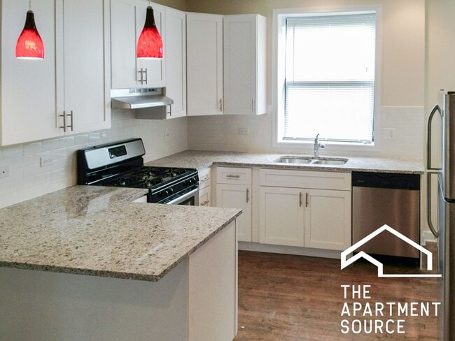 Building Photo - 1819 W Leland Ave Unit 3