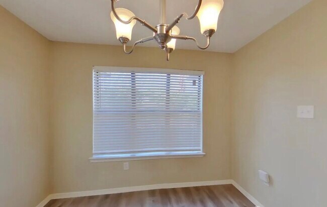 Photo - Spacious 3-Bedroom House with Cozy Living Spaces