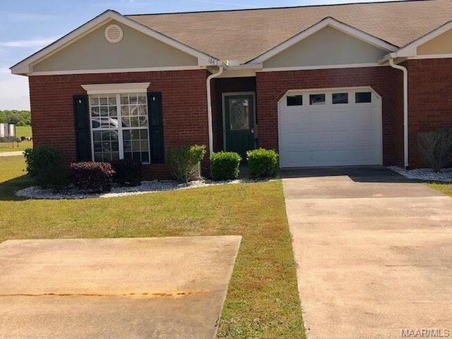 One Car Garage. Long driveway that can fit up tp two vehicles and a bonus side parking pad. - 184 Concord Ave Townhome