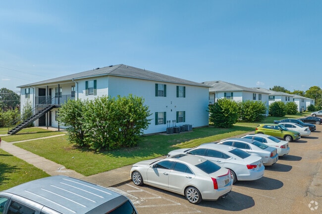 Ample Parking Available at Both Campuses - Curtis Moore Apartments