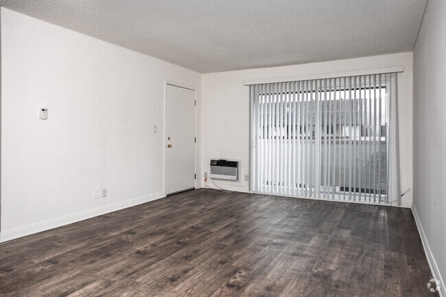 2BR, 1.5BA - 1,000SF - Living Room - Brentwood Apartments