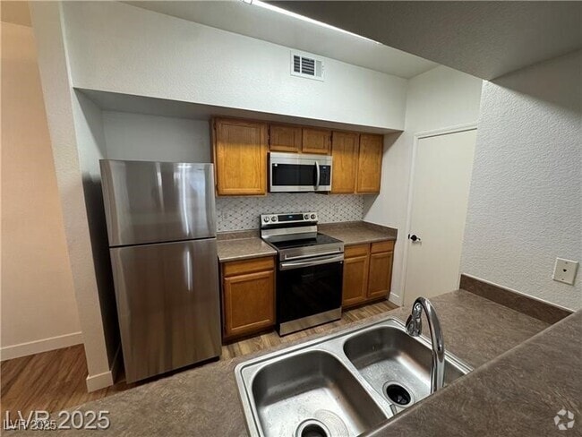 Building Photo - 6650 W Warm Springs Rd Unit 1006 Rental