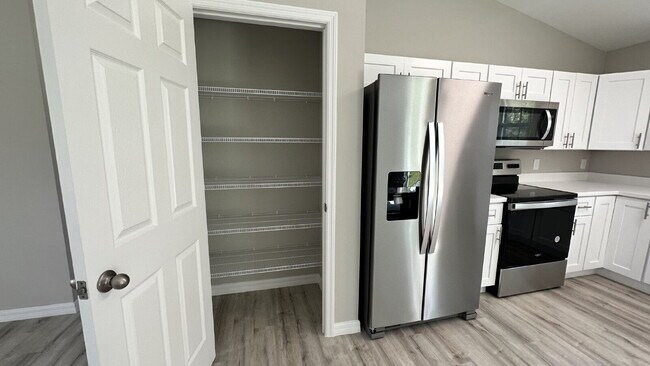 Photo - ***COMING SOON*** Beautiful 4BR/2BA 2 car garage home. Home is currently being enjoyed by another...