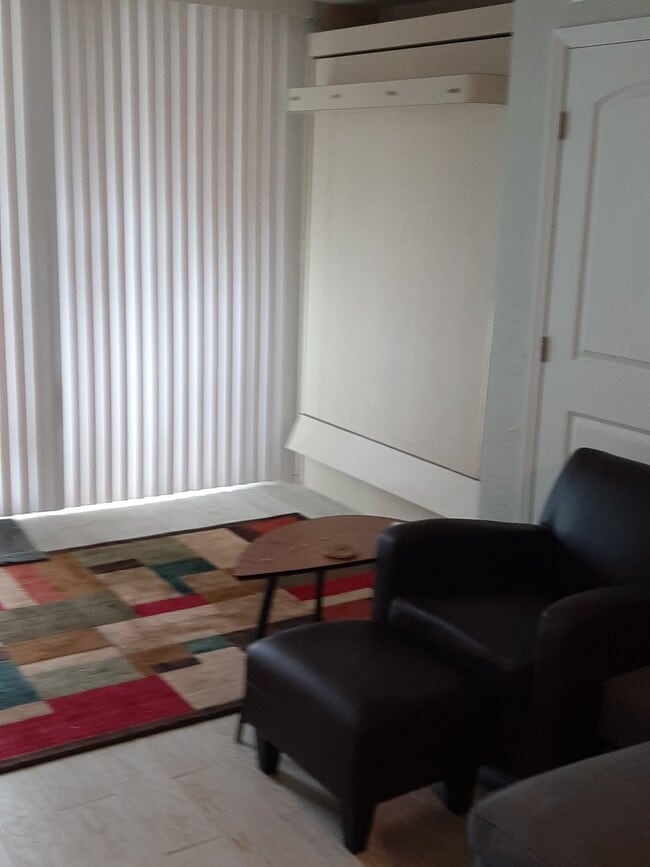 Bed folds into wall - 2727 N atlantic Ave Unit 0417