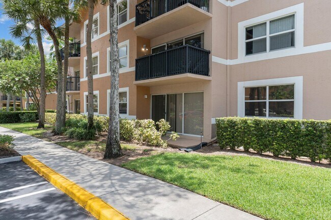 Photo - 9055 Wiles Rd Condo Unit 105