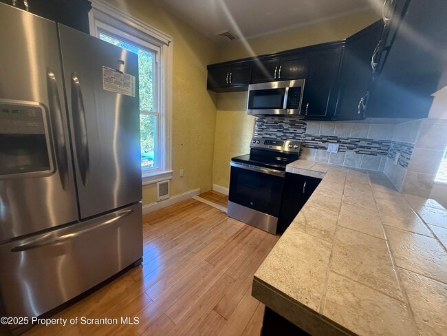 Photo - 124-126 10th Ave Apartamento