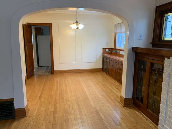 Living room to dining room. - 6830 Kinsman St