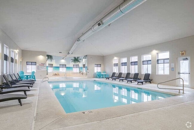 Our clubhouse includes an indoor clubhouse for year-round swimming. - Cascade Pines Duplexes Rental