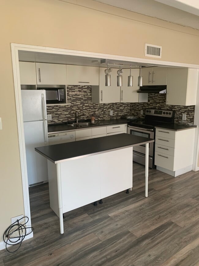 kitchen open space - 9995 E Harvard Ave Unit 216