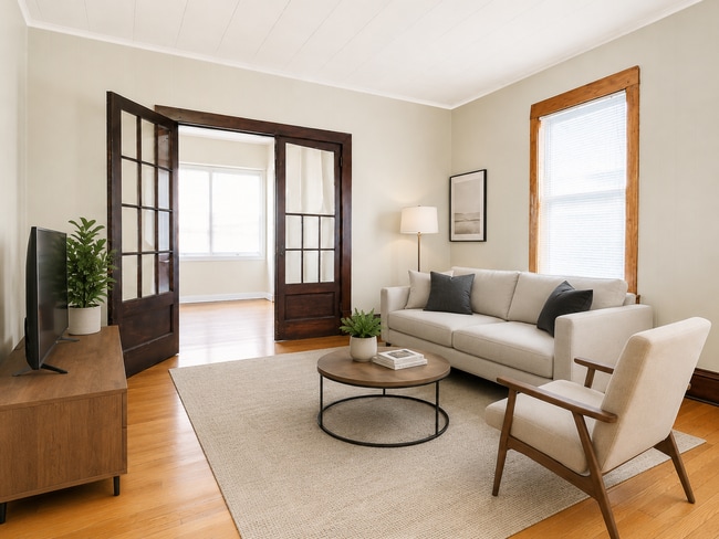Building Photo - Spacious 2BR + Sunroom Main Floor in NE Arts District – Steps to Logan Park & Breweries Unit 1