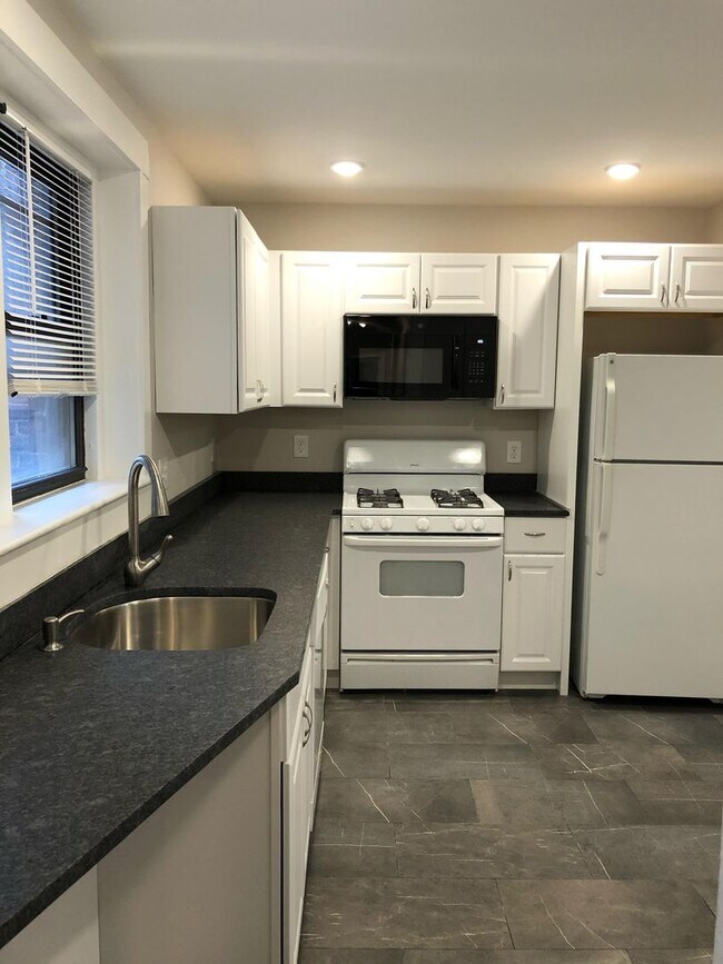 Photo - Avl 6/1 - Porter Sq 3.5BR, hot water inc, updated kitchen!