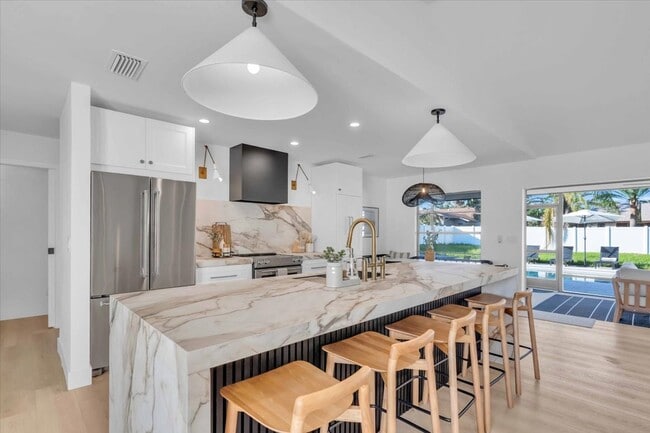 Photo - 5BR New Pool 10 min from Beach Fully Furnished