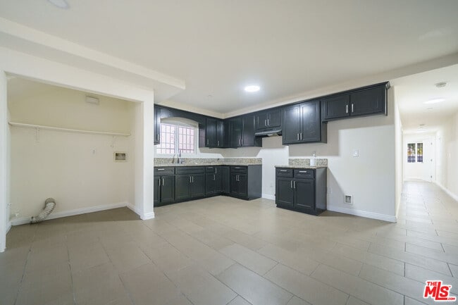 Photo - 10952 1/2 Wilmington Ave