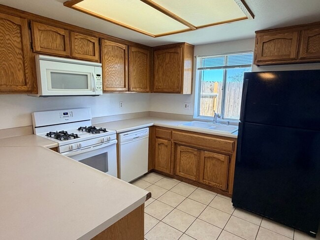 Photo - 3+2 w/garage and large fenced backyard