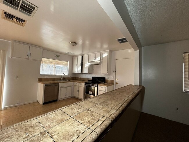 Photo - Coming Soon: 3 Bedroom Home with Solar and 2-Car Garage