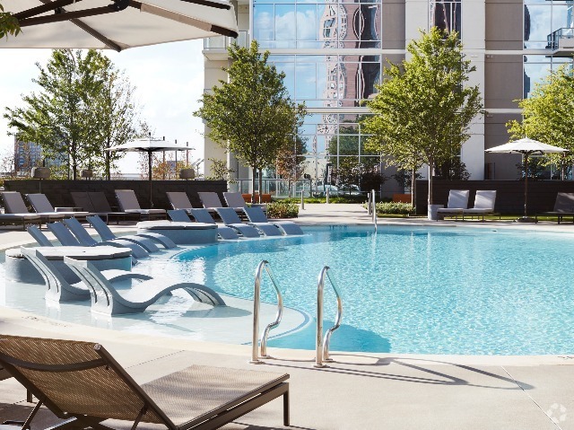 Lounge pool side or grab some shaded seating - Ardan Rental