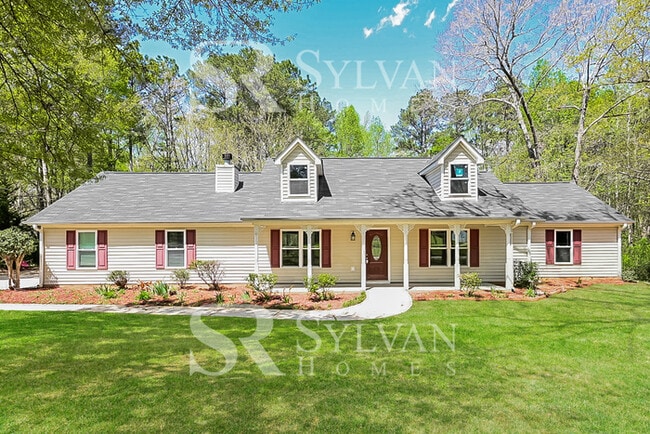 Building Photo - The living is easy in this 3 bedroom, 2 bathroom home