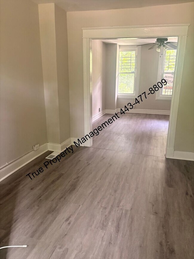 Photo - Spacious 3 Bedroom Home with Backyard & In-Unit Washer/Dryer