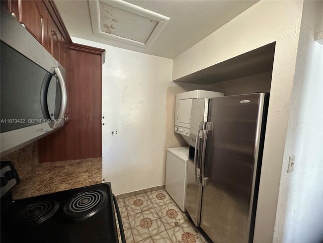 Building Photo - 6675 W 26th Ct Unit 23-9