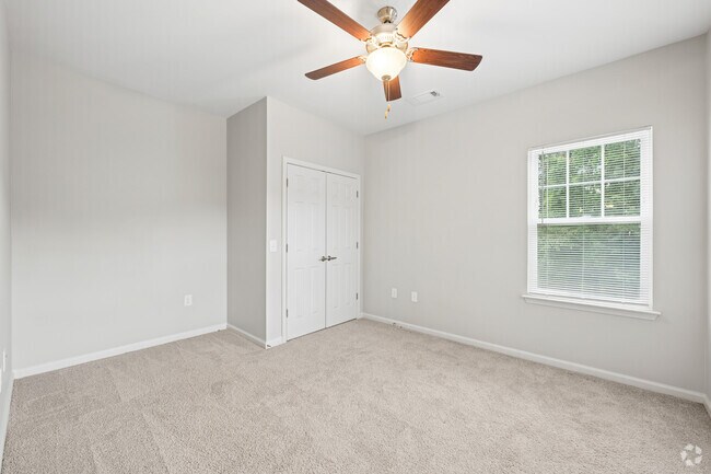 3BR, 2BA - 1,297SF - Primary Bedroom