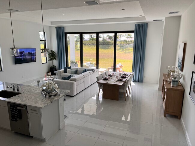 Our open living area with 12 foot tray ceilings and gorgeous view - 9096 SW Arco Way House