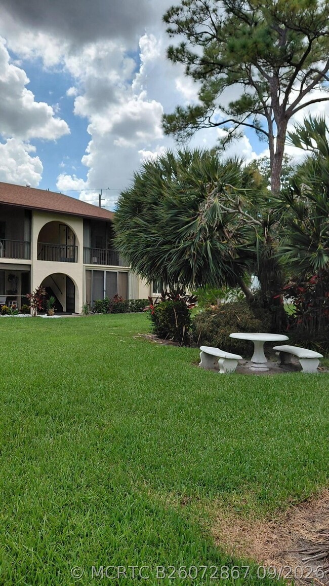 Building Photo - 5991 Whispering Pine Way Unit C2
