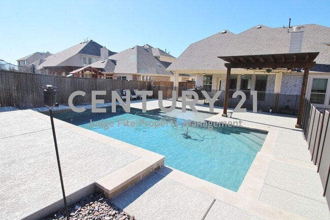 Photo - Executive 2-Story 5/4/2 with Sparkling In-Ground Pool in Mansfield!