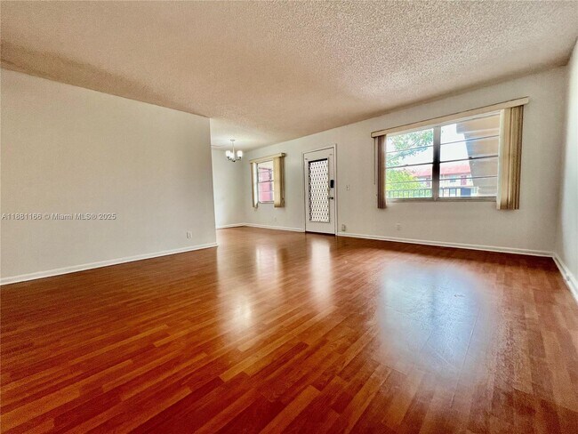 Building Photo - 801 SW 133rd Terrace Unit 317K Rental
