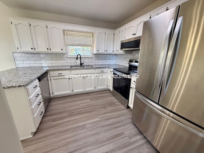 Photo - Beautifully Updated 3 Bed, 2 Bath Split-Level Home with Finished Basement