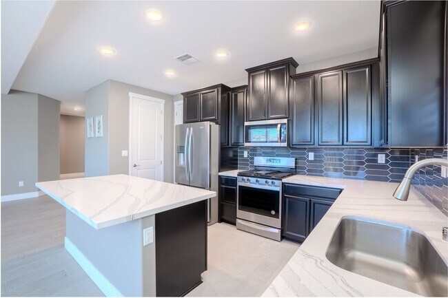 Photo - Fully furnished 3 bedroom / 3 bathroom plus an office.