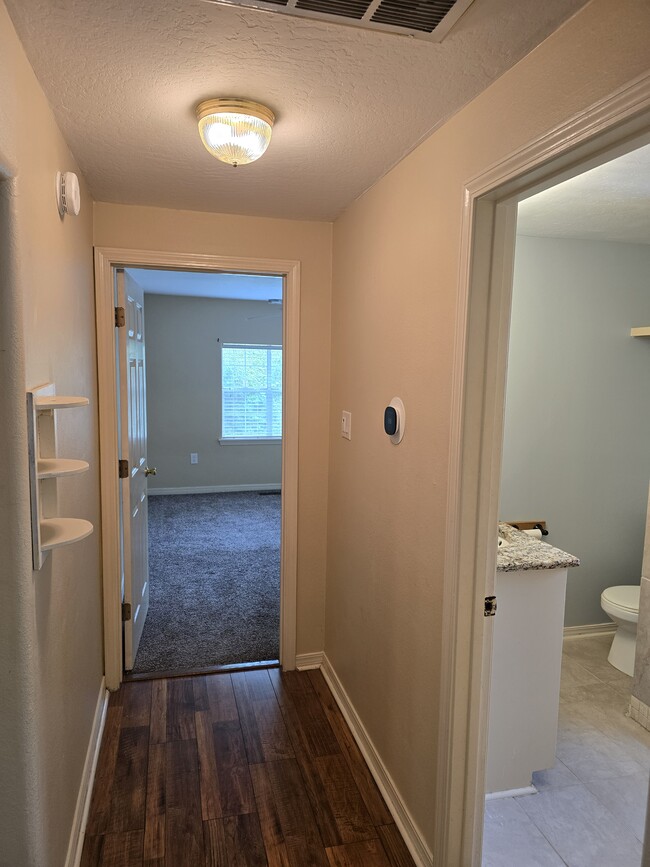 Hallway leading to main bedroom and bathroom - 3612 Barry Ave Unit 1