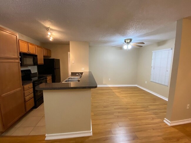 Photo - Spacious 1/1 Den with Screened Lanai Unit 103