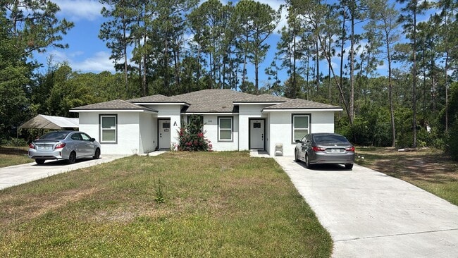 Building Photo - Spacious Duplex 3/2 Newly Built and Centra... Rental