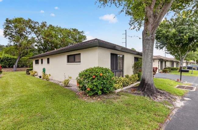 Photo - "Spacious 2-Bed, 2-Bath Boynton Beach Gem with Modern Granite Elegance – 1400 Sq Ft!" Unit APT A