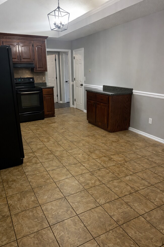 Photo - Charming All-Brick Corner Lot Home with Hot Tub & Fenced Yard