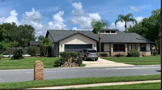 Building Photo - **Recently upgraded 4/2 pool home in Longw...