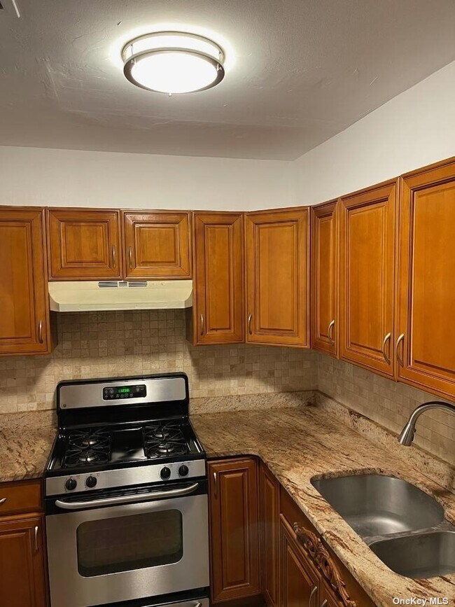 Photo - 62-10 Woodside Ave Unit 405