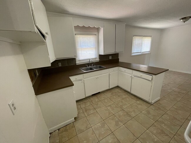 Photo - Freshly painted 3 bedroom 1.5 bath house with very large yard! Pet Friendly!
