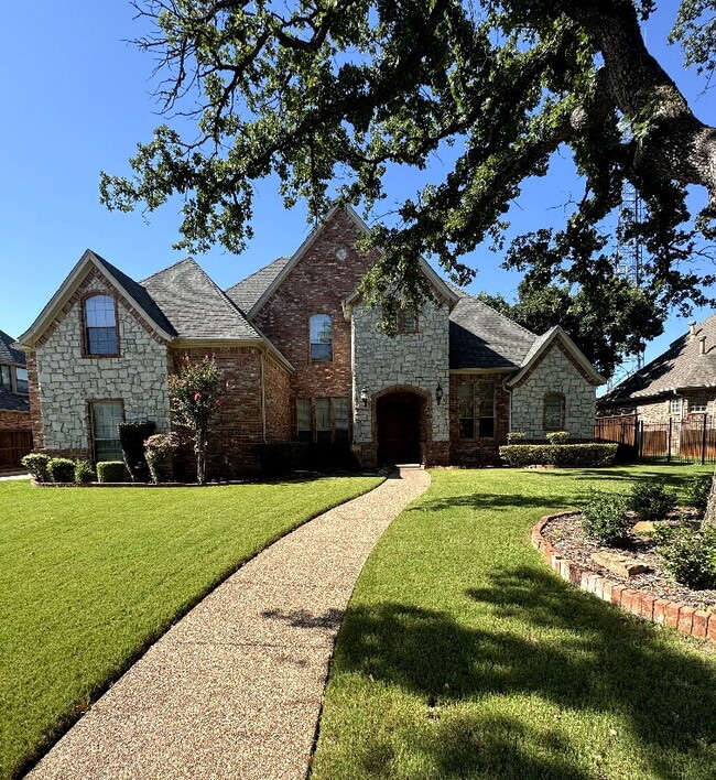 Building Photo - "Luxurious 5-Bed, 4-Bath Retreat in Grapev... Rental