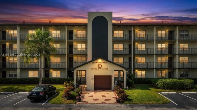 Building Photo - 12950 SW 13th St Unit 309D