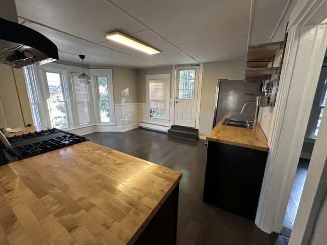 Photo - Bright & Spacious 3BR Second-Floor Apartment with 2-Story Living in Rochester!