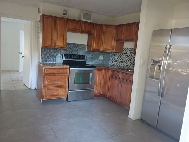 Building Photo - 95 NE 41st ,I-129 Oakland FL , 33334 Unit # I-129 Rental